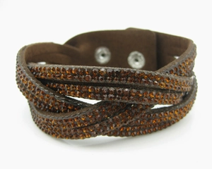 Three-layer amber rhinestone braided bracelet with silver-tone snap button closures