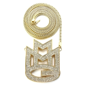 Close-up of hip hop CMG letter pendant with diamonds and golden Franco chain detail