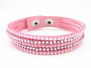 Pink multi-layer suede bracelet with rows of crystal rhinestones and silver snap buttons