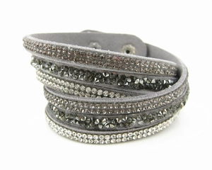 Close-up of grey velvet multi-layer wrap bracelet with gradient crystal rhinestones
