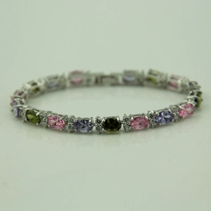 Fashion zircon bracelet with pink, purple, and green oval gemstones in silver plating
