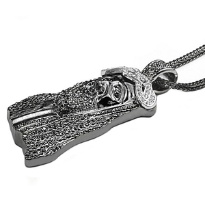 Detailed view of hip hop Jesus pendant with cubic zirconia on a rope chain necklace