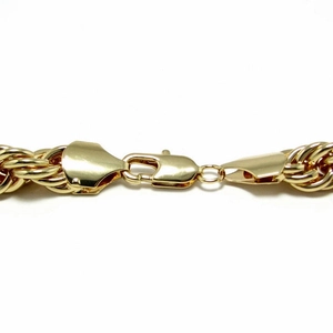 Detail of 10mm golden rope chain featuring a secure lobster clasp and polished finish