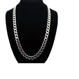 Classic 12mm silver cuban link chain necklace displayed on black velvet jewelry stand