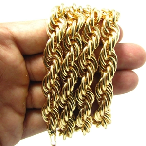 Detailed close-up of 10mm thick golden rope chain with intricate spiral weave