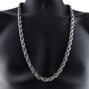 Detail of 10mm thick silver rope chain necklace on a black mannequin bust
