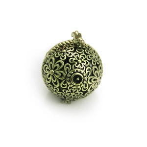 Antique gold hollow flower ball pendant with opening hinge and filigree design