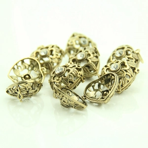 Vintage bronze hollow heart locket pendants with floral pattern and crystal inlay