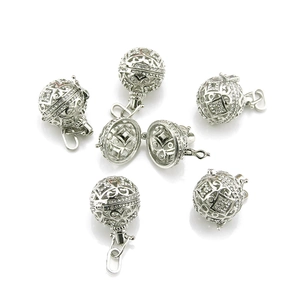 Silver vintage hollow essential oil diffuser pendants with sparkling crystals set