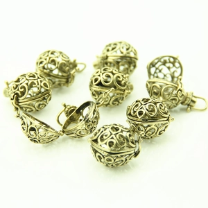 Retro brass hollow heart cage pendants with scrollwork for DIY necklace making