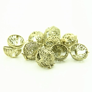 Detailed view of antique bronze hollow tree of life locket pendants for DIY jewelry