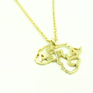 Golden Africa map necklace featuring an intricate hollow design with Africa text
