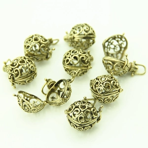Set of 9 vintage bronze heart hollow-out lockets for DIY necklace pendants