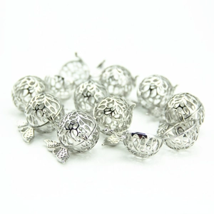 Silver hollow apple-shaped pendant locket with floral cage design for DIY jewelry