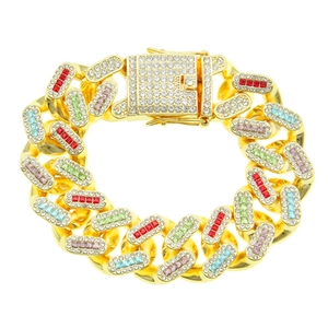 Bracelet gourmette doré luxueux avec diamants colorés et pierres de zircone givrées