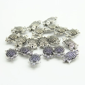 Antique silver owl locket pendant with hollow filigree design for DIY jewelry making