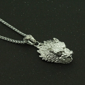 Hip hop silver wolf head pendant necklace with wheat chain on shimmering black background