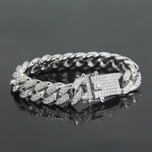 Iced out silver Cuban link bracelet with diamond-encrusted box clasp for men