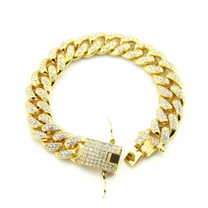 Detailed close-up of 12mm gold Cuban link bracelet with full rhinestones and secure box clasp