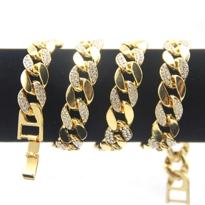 Men's hip hop 18K gold plated Cuban link necklace with sparkling crystals on black velvet