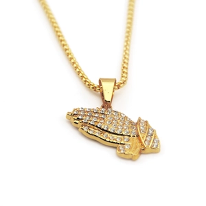 Iced out praying hands pendant necklace in gold finish with sparkling rhinestones