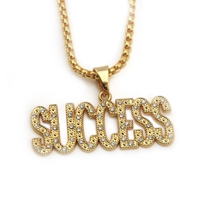 Iced out SUCCESS letter pendant necklace in gold finish with sparkling rhinestones for men
