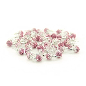 Close-up of pink pavé crystal ball earrings with silver pins and silicone backs