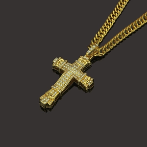 Men's hip hop gold cross pendant necklace with white stones and curb chain accessory