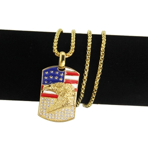 Hip hop style gold dog tag necklace featuring eagle and USA flag design with rhinestones