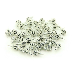 Close-up of 10mm sparkling crystal clay ball stud earrings with black and white dots