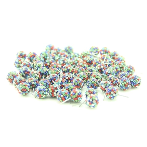 Macro shot of 10mm colorful rhinestone clay ball earrings with red blue green white studs