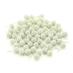 Macro shot of 10mm candy-colored Shamballa earrings with sparkling white crystals