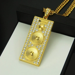 Hip-hop speaker pendant necklace with shimmering crystals on a golden chain link