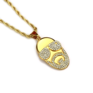 Pendentif portrait hip hop doré avec strass brillants et chaîne torsadée pour homme