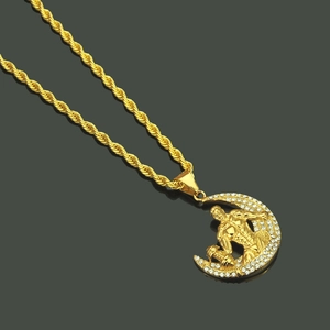 Collier croissant de lune doré avec pendentif haltérophile et cristaux brillants