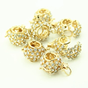 Golden hollow sphere necklace pendant with pavé rhinestones and a bail attachment