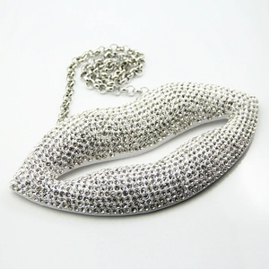 Sparkling oversized red lips pendant necklace with pavé crystal rhinestones and long chain