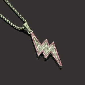 Pink and white iced out lightning bolt pendant necklace on a polished box chain