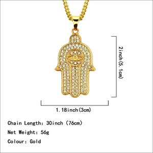 Gold Hamsa Hand pendant necklace with iced out rhinestones and blue eye, 76cm chain length
