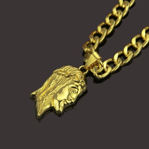 Gold Jesus head pendant with 3D details on a Cuban link chain for men hip hop jewelry