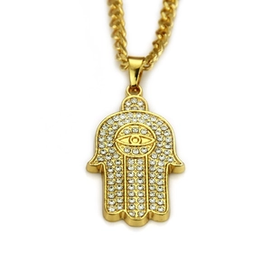 Gold Hamsa Hand pendant necklace with iced out crystals on a thick cuban chain
