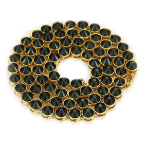 Hip hop gold necklace featuring large black pointed pyramid crystals in a spiral layout