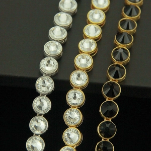 Hip hop tennis necklaces in gold and silver finish with large rhinestones on black background