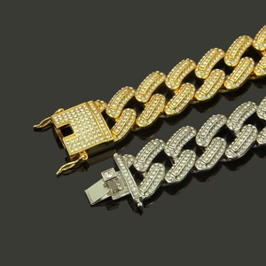 Hip-Hop Cuban Link Armband in Gold und Silber mit funkelnden Strasssteinen besetzt