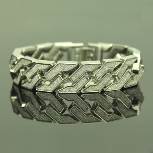 Men's hiphop chunky curb chain bracelet with silver glitter finish on reflective surface