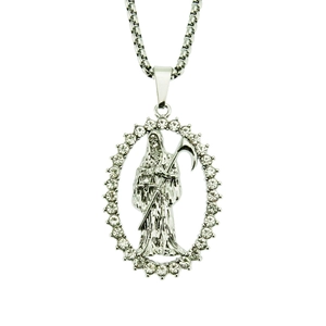 Macro view of iced-out silver Grim Reaper pendant with box chain and clear crystal halo