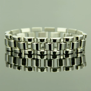 Close-up of hip hop style polished silver metal watch strap bracelet for men