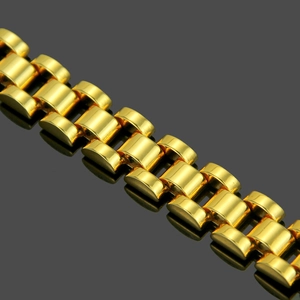 Luxury gold polished president style chain bracelet for men with metallic luster on black mirror