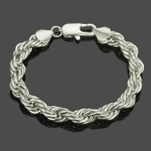 Polished silver rope chain bracelet with a secure lobster clasp in a minimalist style