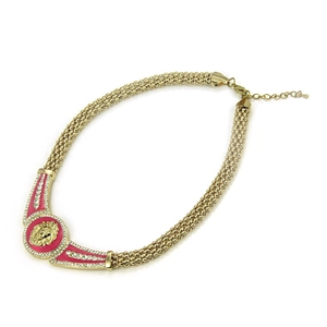 Gold-tone lion head pendant necklace with pink enamel and sparkling rhinestones